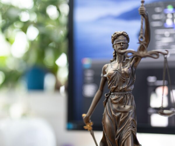 bronze-statue-of-a-woman-with-scales-as-the-symbol-2026-01-08-00-28-14-utc (1)